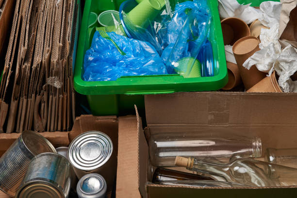 istock sorted trash of cardboard, glass and plastic bottles, polyethylene, cups, paper, iron cans 1150978167