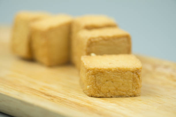 istock Fish meat tofu, yellow meatball square shape 1150978545
