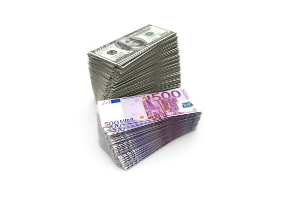 istock Deck of Five Hundred Euro and One Hundred Dollar Banknotes on White 1150980495