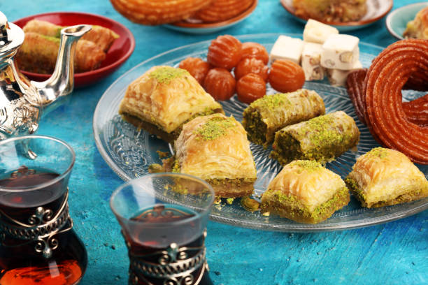 istock Middle eastern or arabic dishes. Turkish Dessert Baklava with pistachio on dishes 1150982183