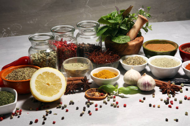 istock Spices and herbs on table. Food and cuisine ingredients with basil 1150983408