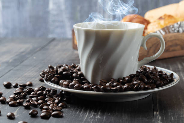 istock cup of hot coffee and roast coffee beans 1150983780