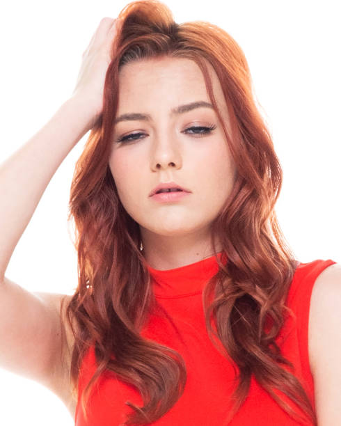 istock Beautiful female in red dress 1150988120