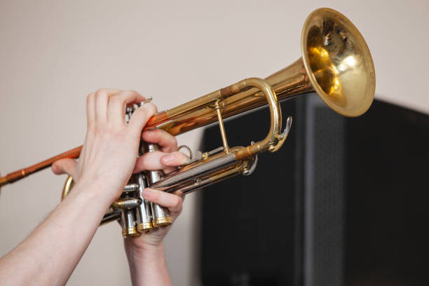 istock Trumpet in trumpeter hands 1150989416