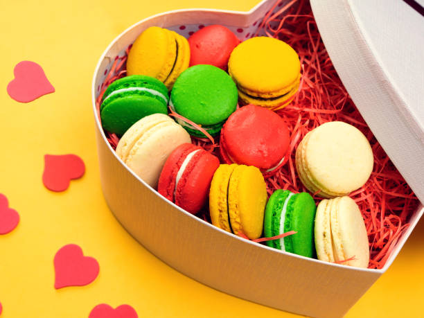 istock Macaroons in a gift box. Heart-shaped box. Copy space. 1150989845