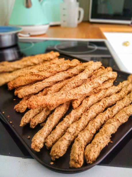 Authentic homemade bread sticks in a kitchen.