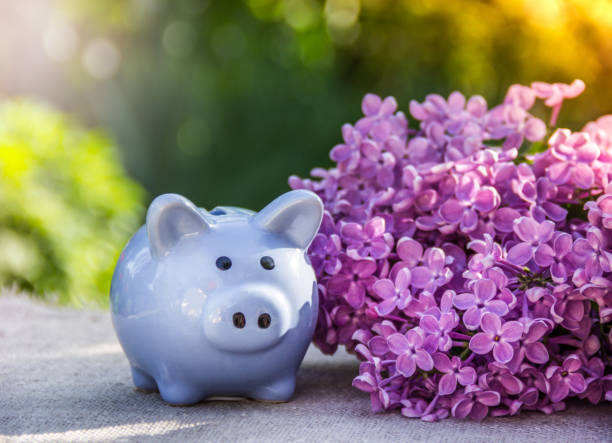 Piggy bank on the table. Blue piggy bank stock photo