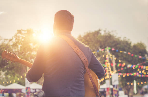 music Musicians are playing guitar on stage. outdoors stock pictures, royalty-free photos & images