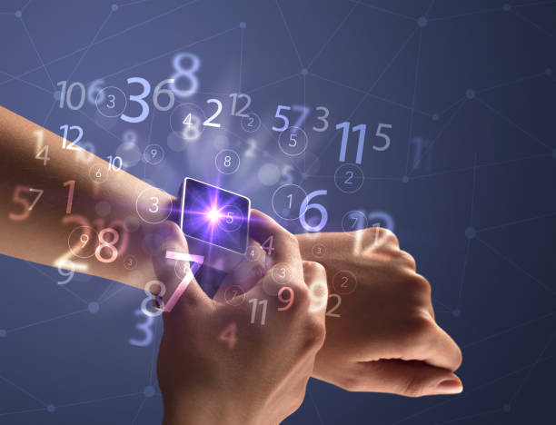 istock Close up hand with smartwatch and numbers 1151000919