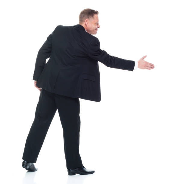 istock Businessman is giving a handshake 1151001653