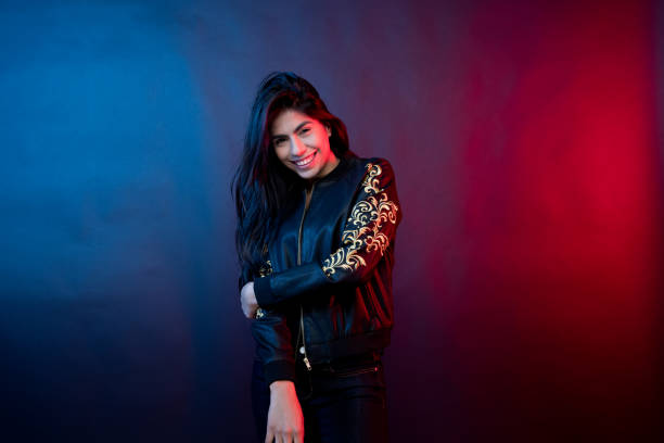 istock Beautiful latino woman wearing a nice jacket 1151002108