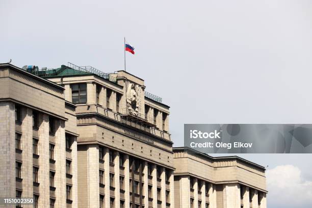 Russian Flag On The Parliament Building In Moscow On Sky Background Stock Photo - Download Image Now