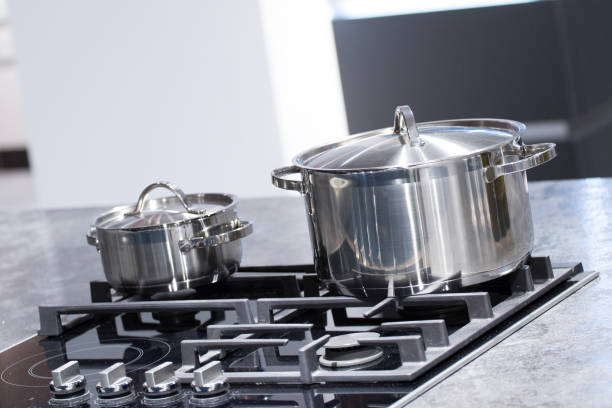 istock chrome pan on the gas cooking plate 1151002420