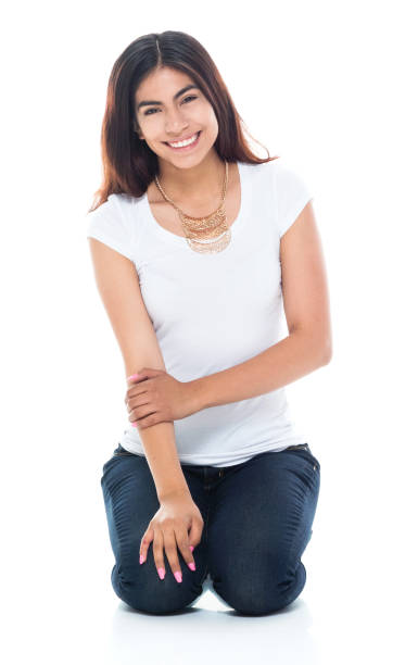 istock Happy female kneeling on the ground 1151003759