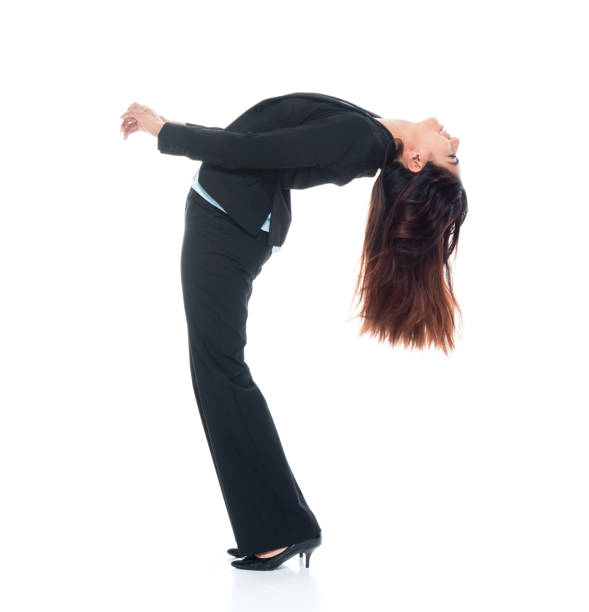 istock Businesswoman bending over backwards 1151004089