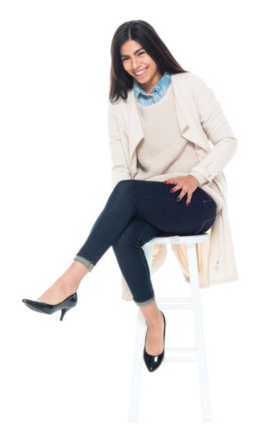 istock Attractive young latino female is sitting 1151006549