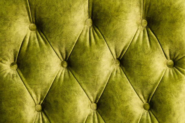 istock Velor lime surface of sofa close-up 1151008426