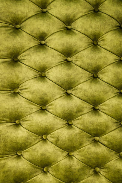 istock Velor lime surface of sofa close-up 1151008471