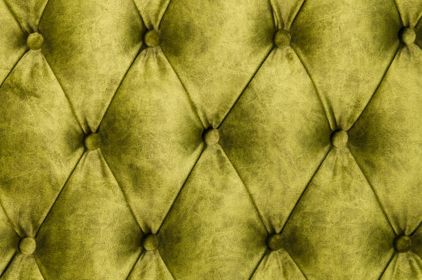 istock Velor lime surface of sofa close-up 1151008566