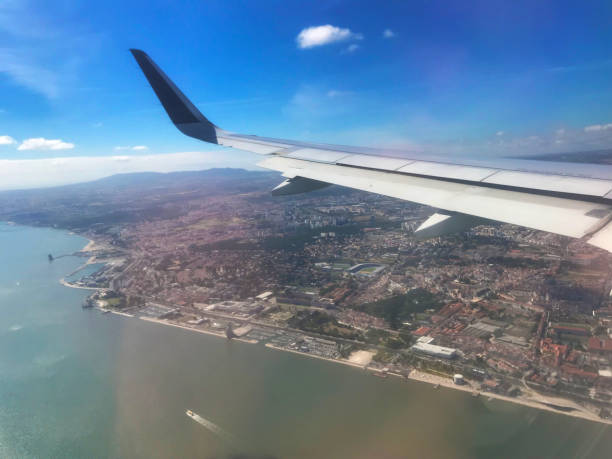Aeroplane wing shot through aircraft window