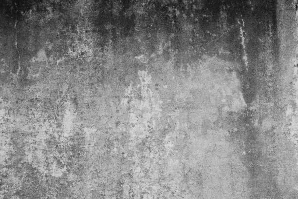 istock Old dirty wall with coarse and polluted structures and cracked. Background in grunge style. Concrete wall in industrial design. 1151010858