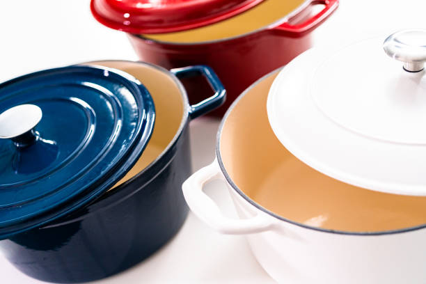 istock Red, white and blue enameled cast iron covered round dutch ovens on 1151011296