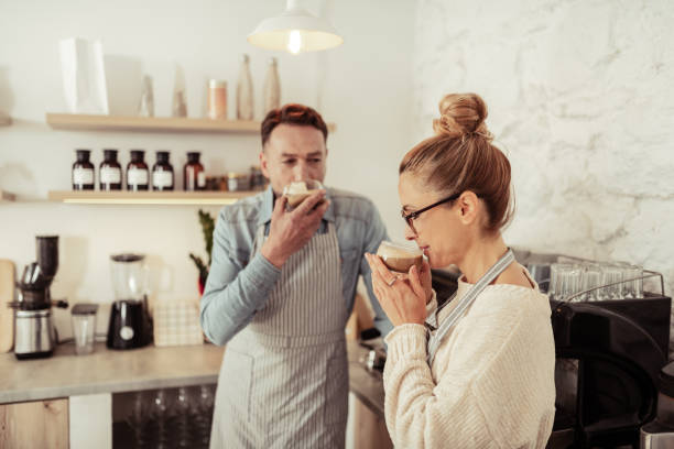 istock Happy couple drinking freshly brewed coffee together. 1151012708