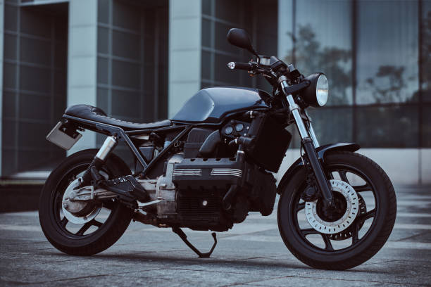 istock Photo of a custom-made retro motorcycle against skyscraper. 1151013267