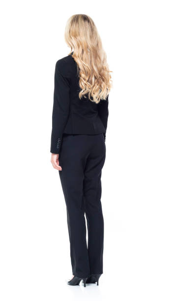 istock Attractive blond businesswoman - hands by side 1151014844