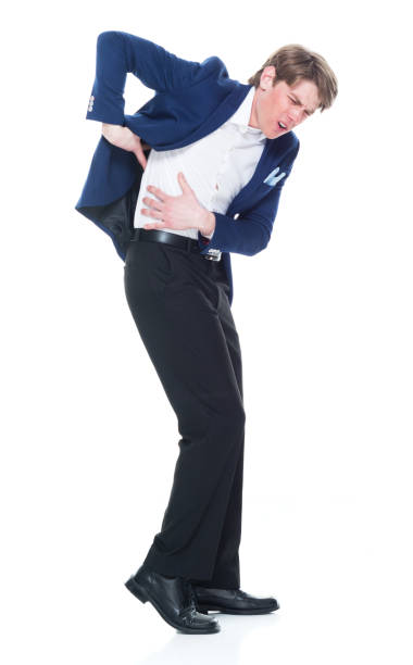 istock Handsome man holding a question mark sign and wearing a blue blazer 1151016135