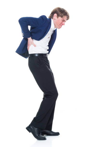 istock Handsome man holding a question mark sign and wearing a blue blazer 1151016136