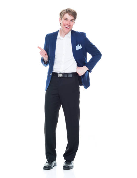 istock Handsome man holding a question mark sign and wearing a blue blazer 1151016211