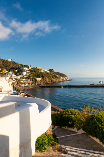 typical narrow streets on the island of panarea in sicily and in the foreground a fig tree typical narrow streets on the island of panarea in sicily and in the foreground a fig tree panarea island stock pictures, royalty-free photos & images