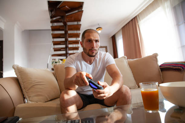 istock Gamer man addicted to video games 1151018542