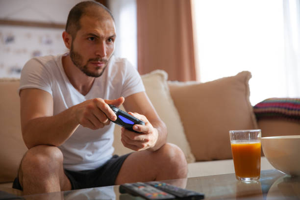 istock Gamer man addicted to video games 1151019685
