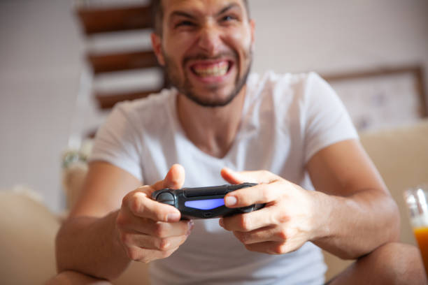 istock Gamer man addicted to video games 1151020038