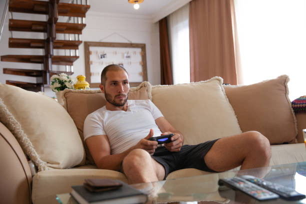 istock Gamer man addicted to video games 1151020225