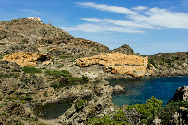 Hiking on Camí de Ronda trail, Cap de Creus Hiking from Cadaqués to Cap de Creus. The region, where Salvador Dalí lived and that he often showed in his paintings. cap de creus stock pictures, royalty-free photos & images