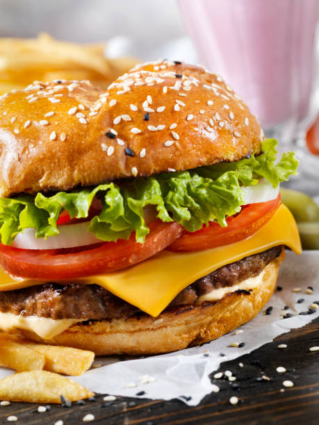 istock Classic Cheeseburger on a Brioche Bun with Fries and a Milkshake 1151021796