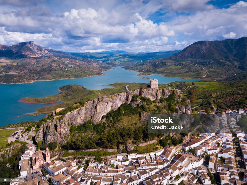 View of Zahara de la Sierra village Panoramic view of Zahara de la Sierra white village in Grazalema mountains, Andalusia, Spain Grazalema Stock Photo