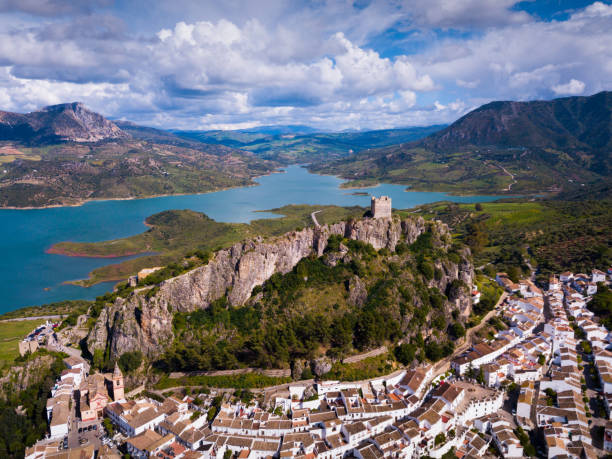 View of Zahara de la Sierra village Panoramic view of Zahara de la Sierra white village in Grazalema mountains, Andalusia, Spain grazalema stock pictures, royalty-free photos & images