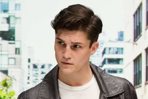 istock Close up view of attractive man wearing a leather jacket 1151025020