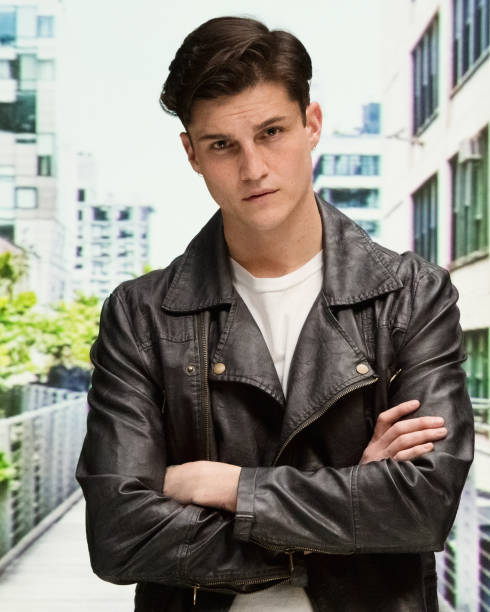 istock Close up view of attractive man wearing a leather jacket 1151025022