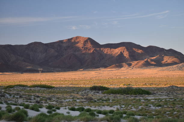 istock Desert Landscape with Shaded Mountains 1151026354
