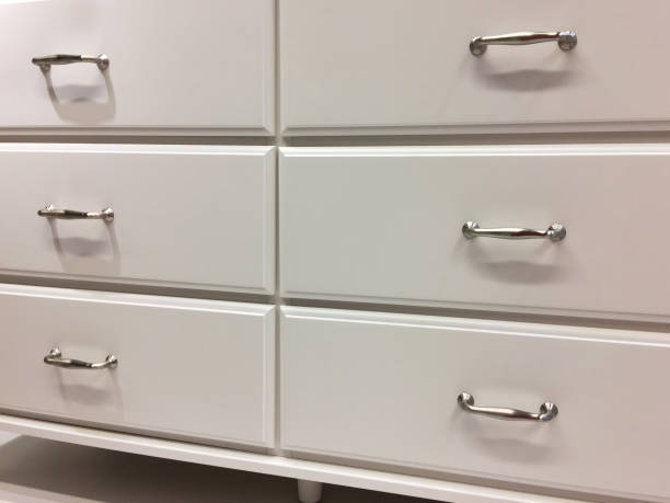istock White wooden cabinet drawers handle 1151029184