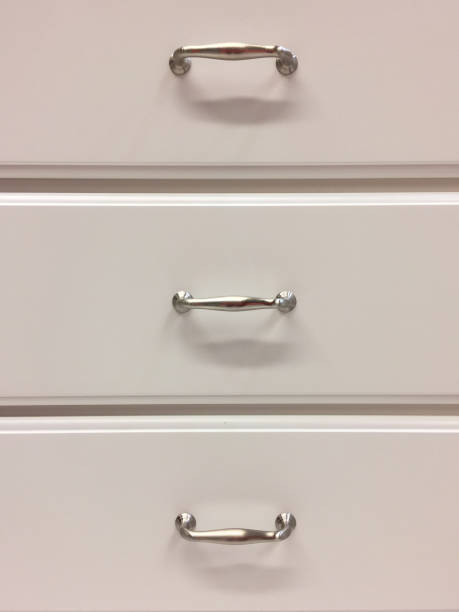 istock White wooden cabinet drawers handle 1151029266