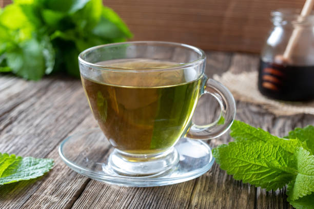 istock A cup of melissa tea with fresh melissa 1151029827
