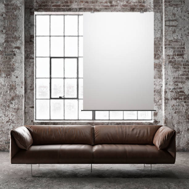 istock Mock up poster with leather sofa in loft 1151044816