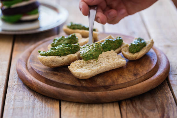 istock Tosted bread slices with spinach pesto 1151047433
