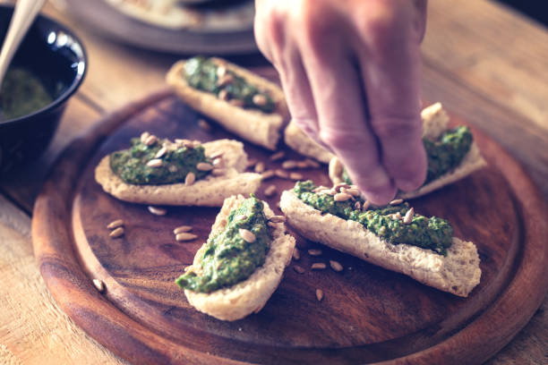 istock Tosted bread slices with spinach pesto ad sunflower seed 1151047434